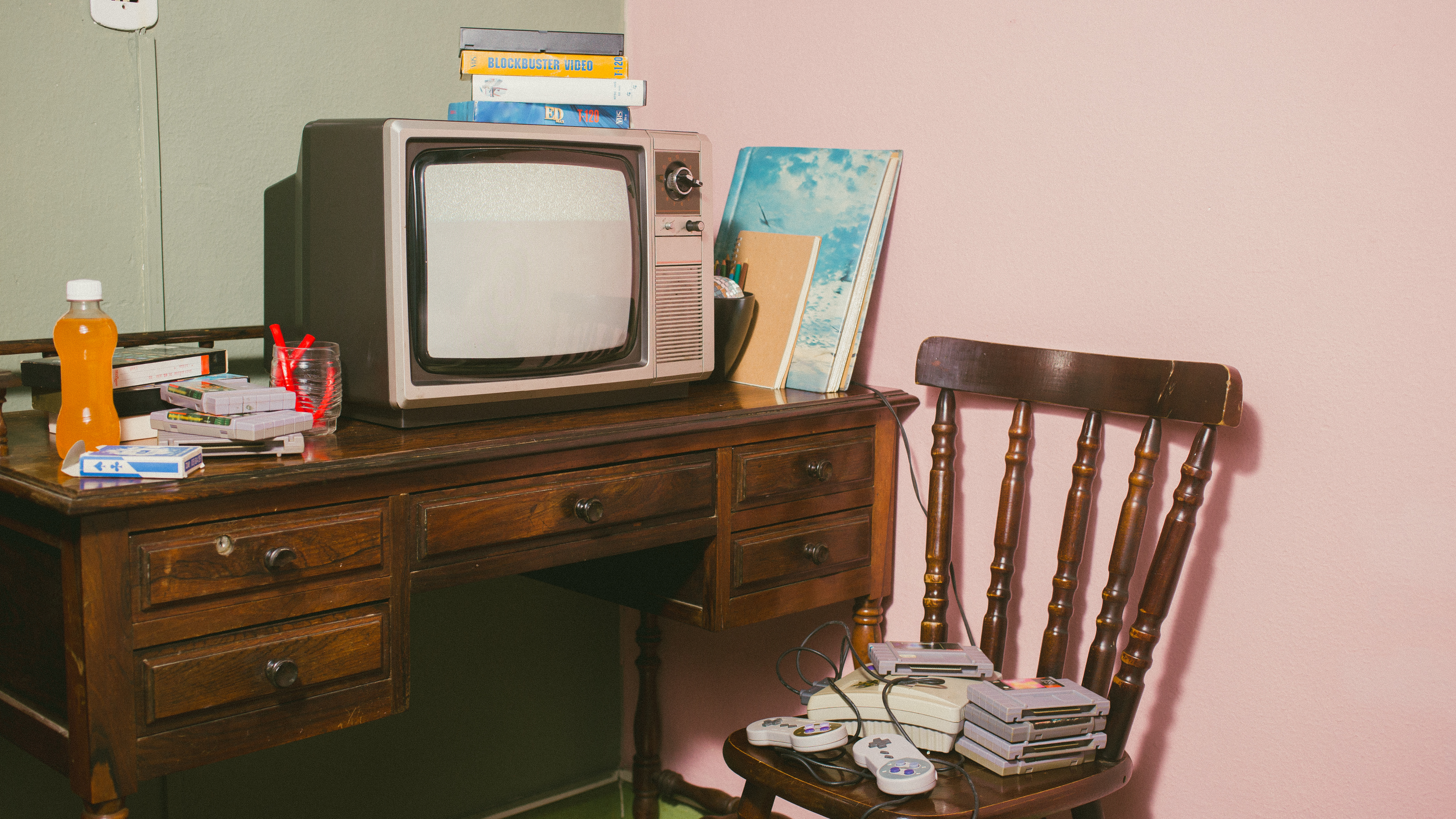 Vintage TV with VHS Tapes and Vintage Games